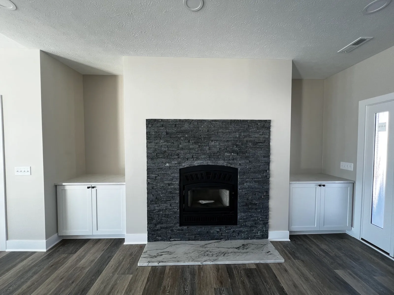 Remodeled living space by ELM Home Services